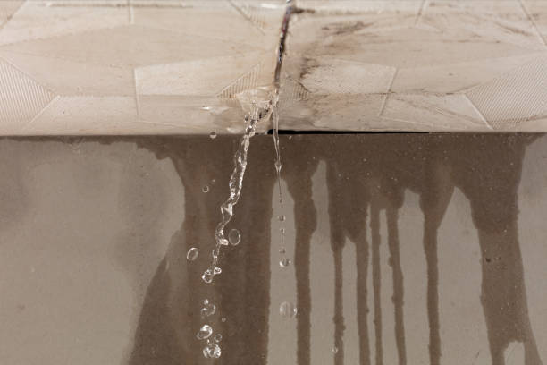 Professional Flood Damage Cleanup technician working in Baker, LA